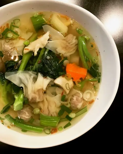 Wor Wonton soup with house made wontons and greens